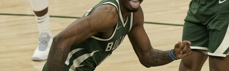 开云电子-哥哥来一个！字母哥哥空切篮下 无人盯防轻松上演双手扣篮